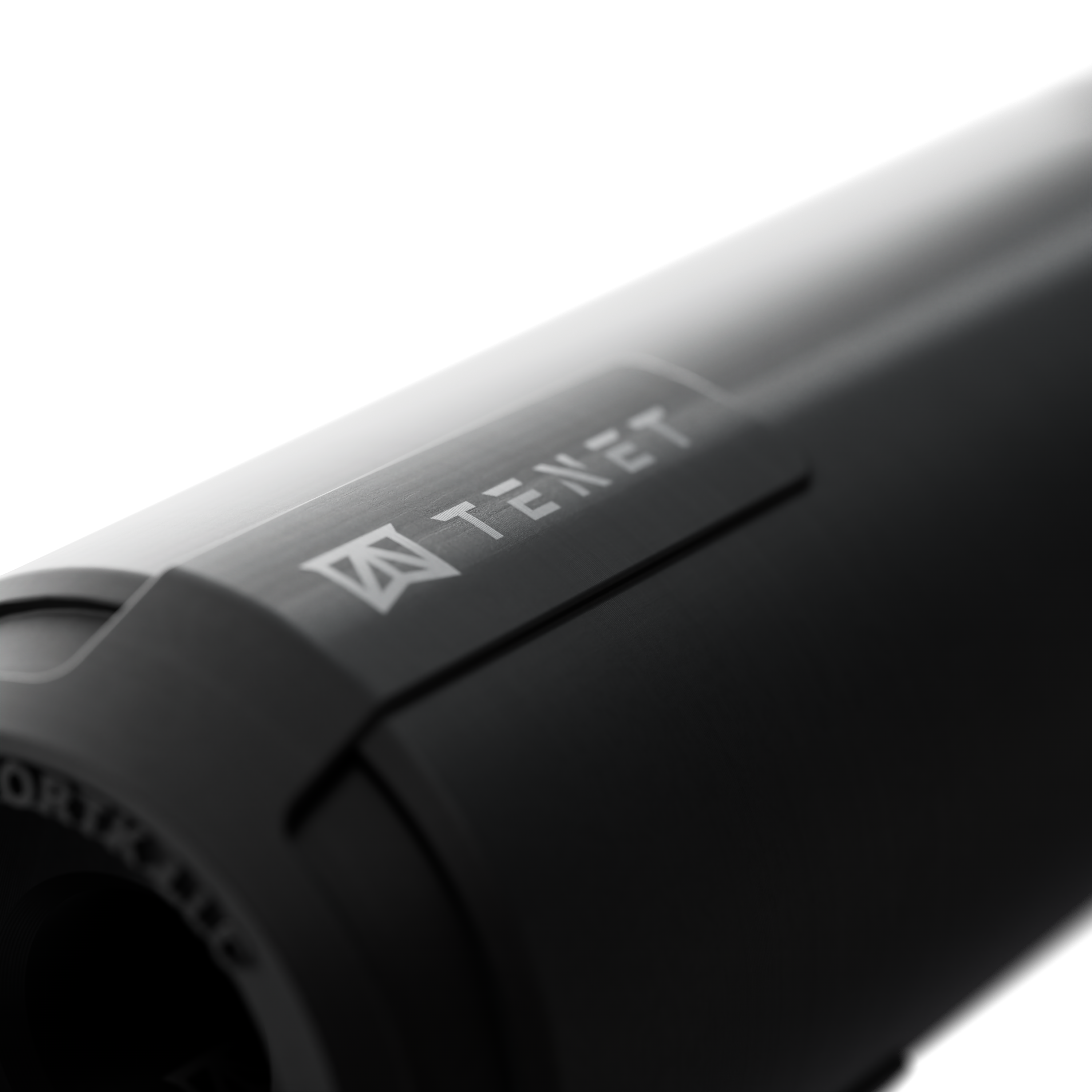 TENET .30-caliber suppressor laser-engraved logo detail close-up