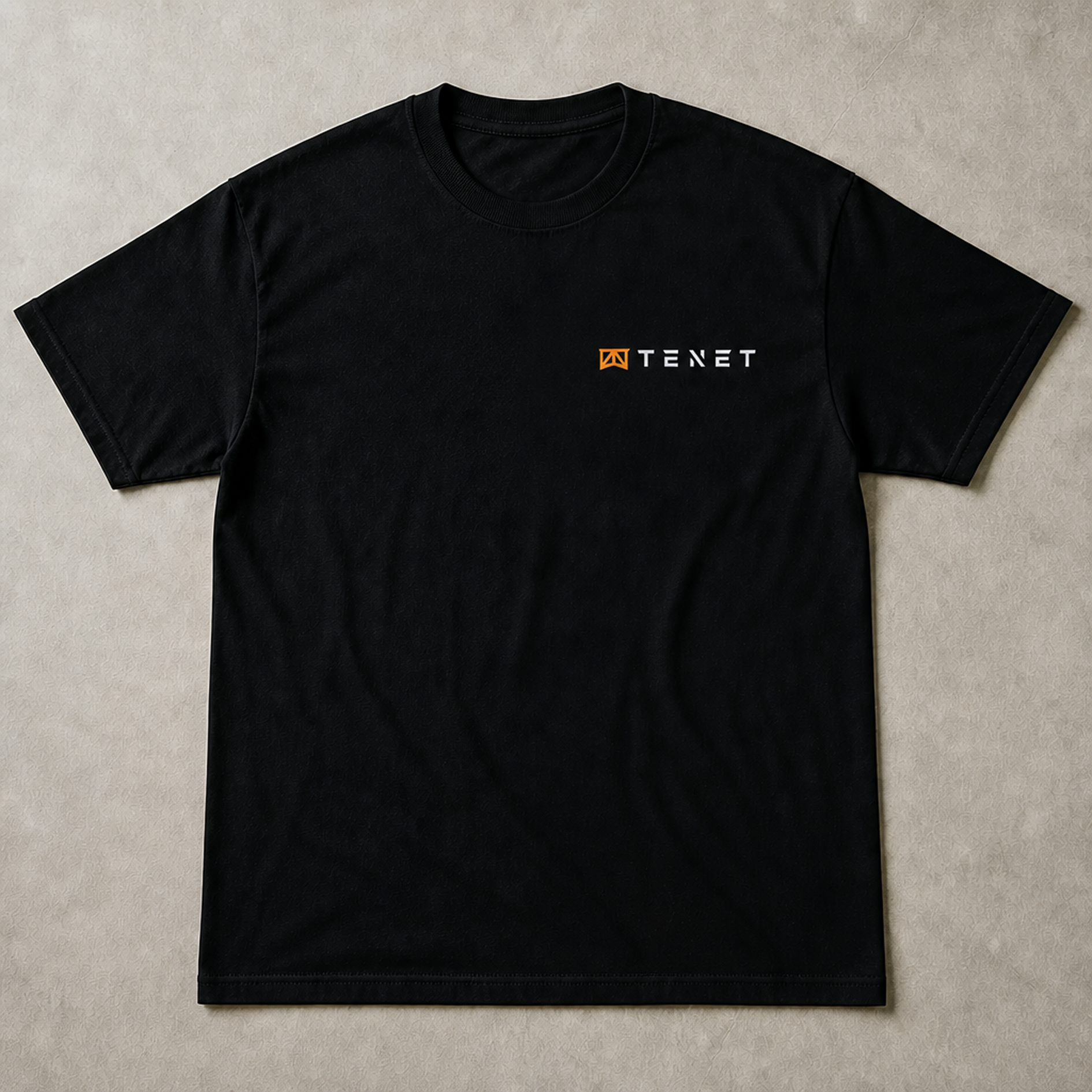 TENET branded black t-shirt with chest logo